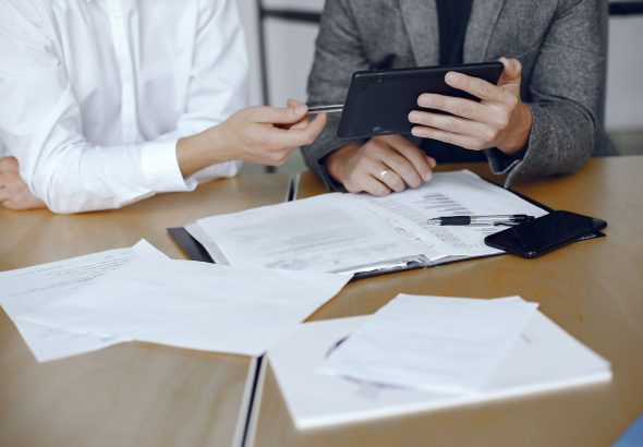 business-men-sitting-lawyers-s-desk-people-signing-important-documents