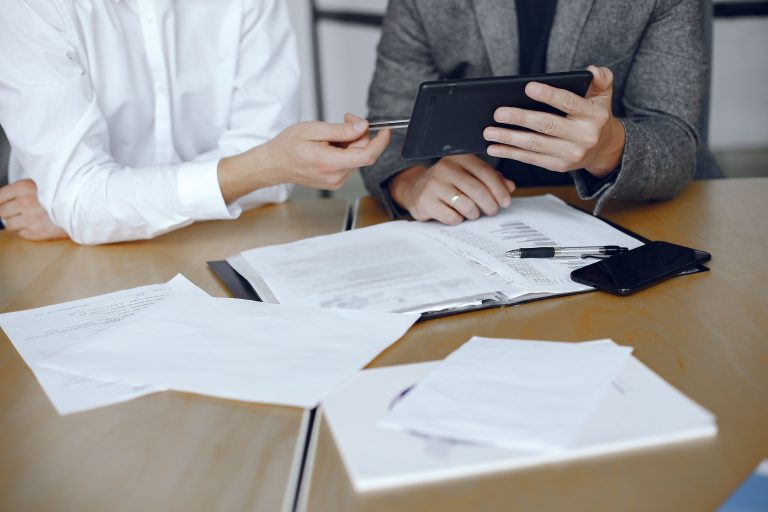 business-men-sitting-lawyers-s-desk-people-signing-important-documents